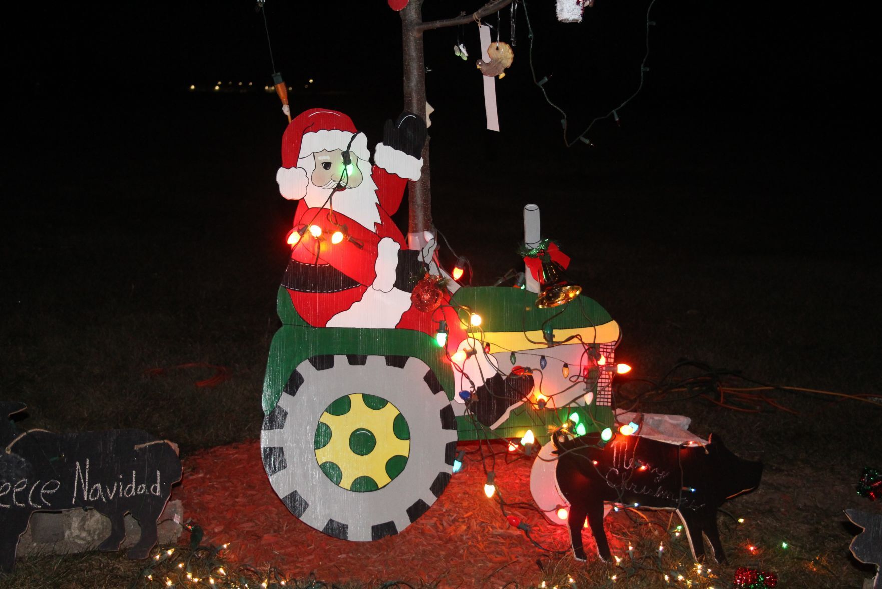 A tractor-driving Santa